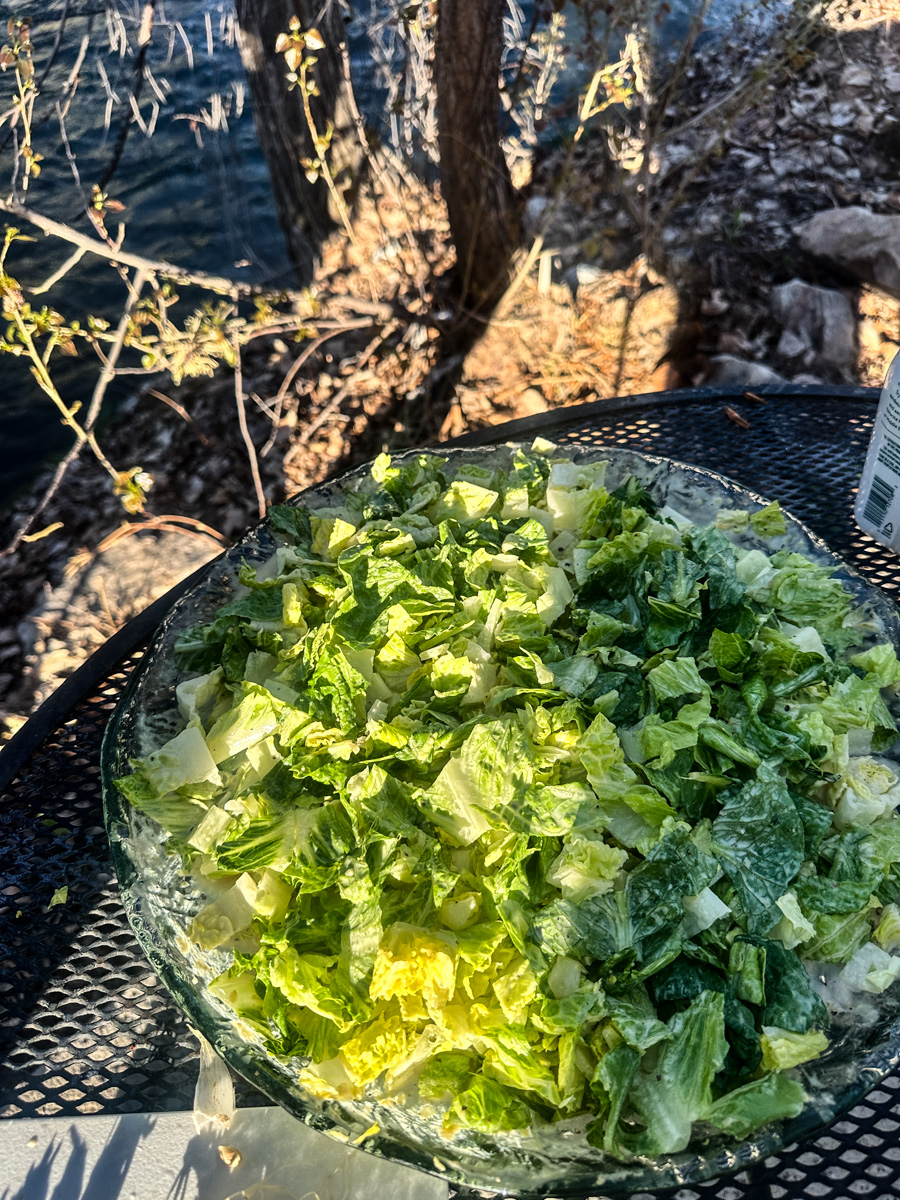 added lettuce to dressing and mix.